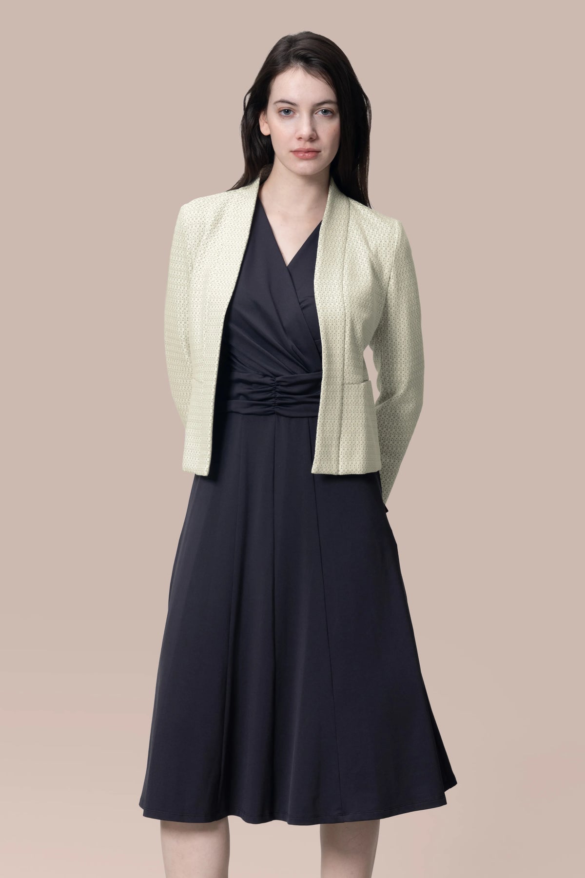 Ivory bolero jacket in glitter jacquard and a mocha gray Mimorin dress (with a circulation-boosting underdress)