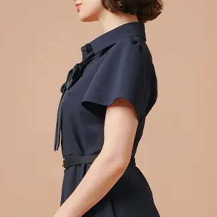 Bell sleeves create a feminine slimming effect.