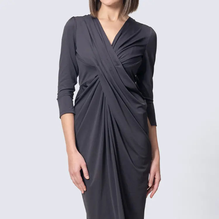 Proprietary high-performance stretch jersey — elegantly maintains body warmth while creating beautifully flowing drape lines