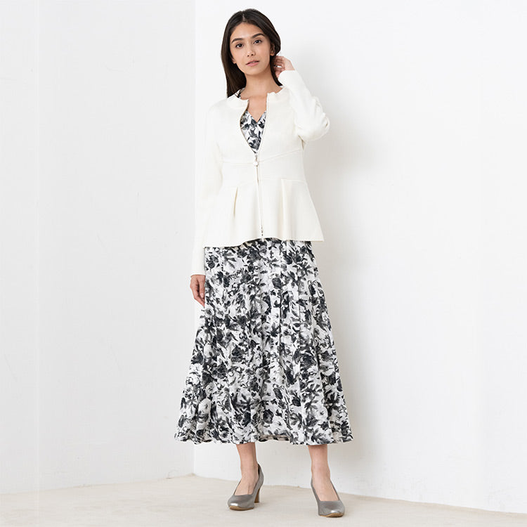 A waist-shaped cardigan creates a feminine silhouette