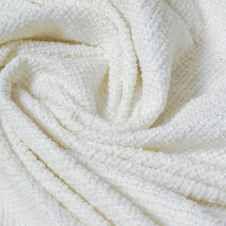 Washable stretch fabric. A refined new tweed style, crafted with Japanese technology